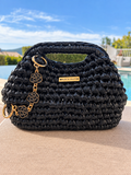 Mini  Riviera noir posé au bord de l'eau et crocheté à la main